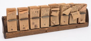 A wooden bus conductor's ticket holder c