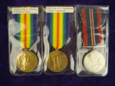 Two Victory Medals and 1939 War Medal:,
