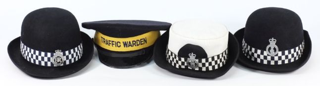 Two Devon & Cornwall Policewoman's peake