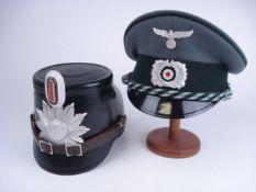 A reproduction Luftwaffe peaked cap, tog