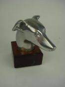 An Art Deco Greyhound head mascot:, unsi