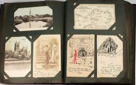 A large Edwardian postcard album: includ