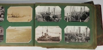 A large Edwardian postcard album: contai
