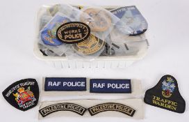 A collection of  police cloth badges fro