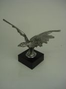 A 1930's Eagle mascot:, on later black m