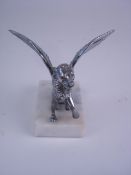A plated Griffin mascot:, unsigned, seat
