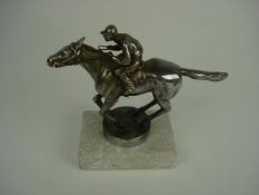 A 1930's equestrian mascot in the form o