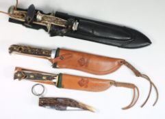 Four Puma antler handled hunting knives