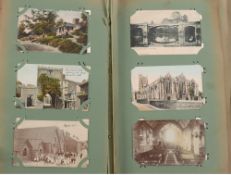 An early 20th century postcards album of