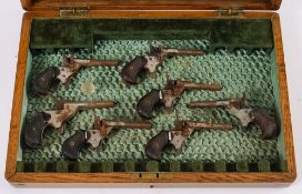 Seven various .22 blank firing single sh