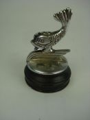 A Simca Dolphin mascot:, circa 1937, on