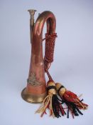 A copper and brass Royal Artillery bugle
