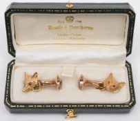 A pair of 9ct gold fox mask and hunting