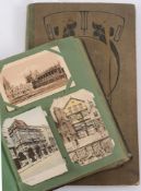 Two Edwardian postcard albums, containin