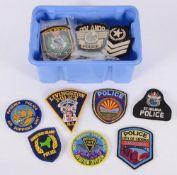 A collection of  police cloth badges fro
