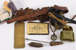 A WWII period prismatic compass,a leathe