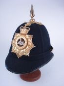 A Gloucester Regiment blue cloth helmet: