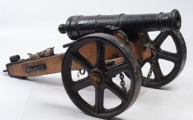A cast iron cannon:, the 23 inch five st