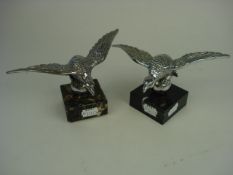 Two eagle mascots by Desmo: with outstre