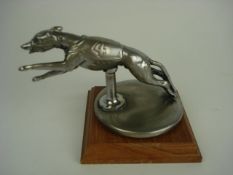 A leaping greyhound radiator cap mascot: