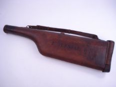 A leather leg 'o mutton gun case inscrib