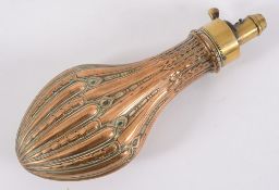 A 19th century copper and brass shot/pow