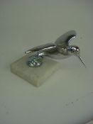 A 1930's Humming bird mascot:, unsigned