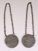 A pair of Edward VII silver spirit label