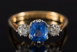 An 18ct gold, sapphire and diamond three