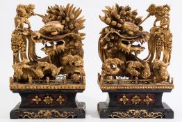 A pair of Chinese carved giltwood temple