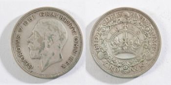 A George V crown: crown in wreath 1928.
