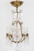A gilt metal nine-branch chandelier: wit