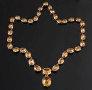 A late 19th century gold and topaz  rivi