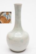 A Chinese pale celadon vase with incised
