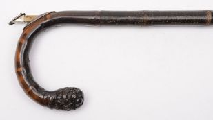 A wood and silver mounted novelty walkin