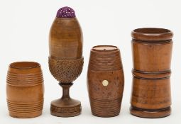 A 19th century treen coin holder: of rin