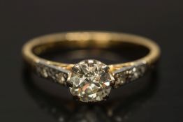 A diamond single-stone ring: the round o