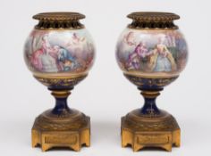 A pair French porcelain and gilt brass m