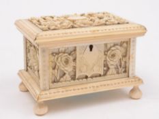 A 19th century carved ivory dressing tab