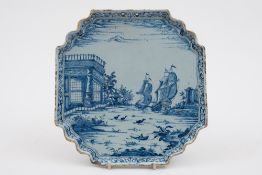 A Dutch blue and white delft plaque: wit