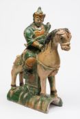 A Chinese 'sancai' glazed pottery roof t