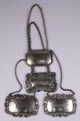 Three silver spirit labels, various make