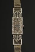 A lady's diamond and sapphire mounted co