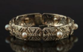 A white gold and seed pearl bracelet: of