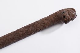 An Indian carved hardwood walking stick: