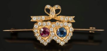 A gold, ruby, sapphire and diamond mount