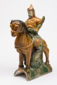 A Chinese 'sancai' glazed pottery roof t