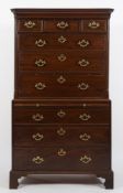 A George III mahogany tallboy:, the uppe
