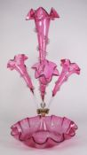 A cranberry glass epergne: with central