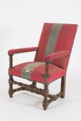 A 17th Century oak and upholstered armch
